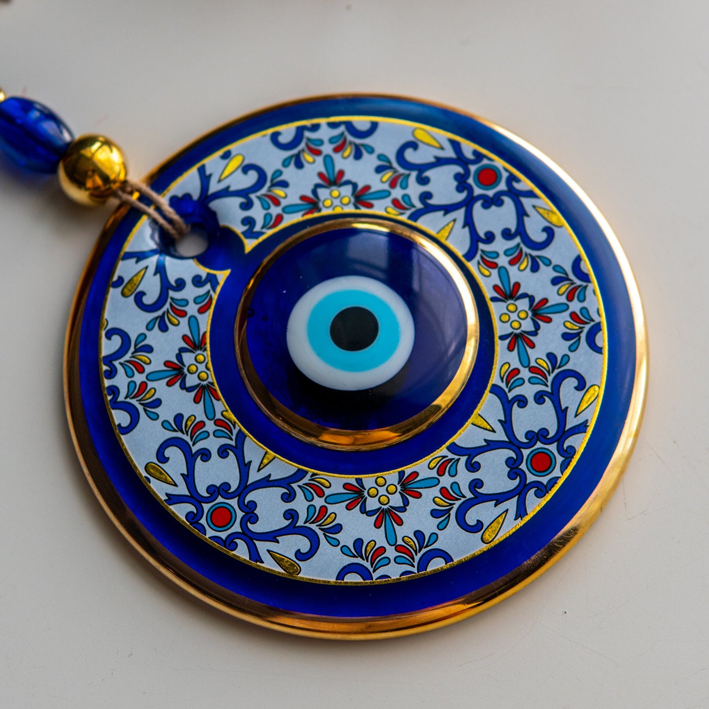 Geometric Patterned Gold Evil Eye Bead