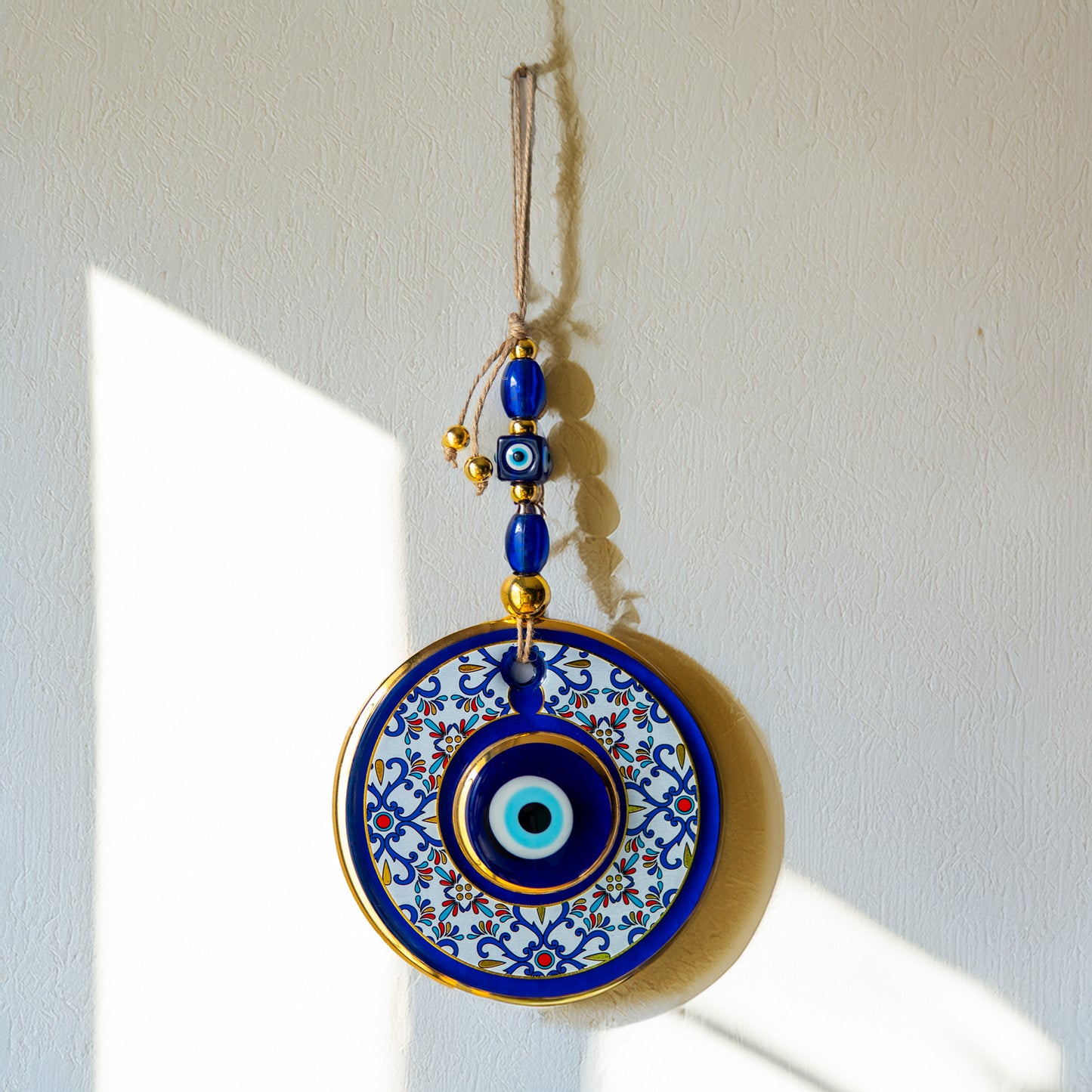 Geometric Patterned Gold Evil Eye Bead